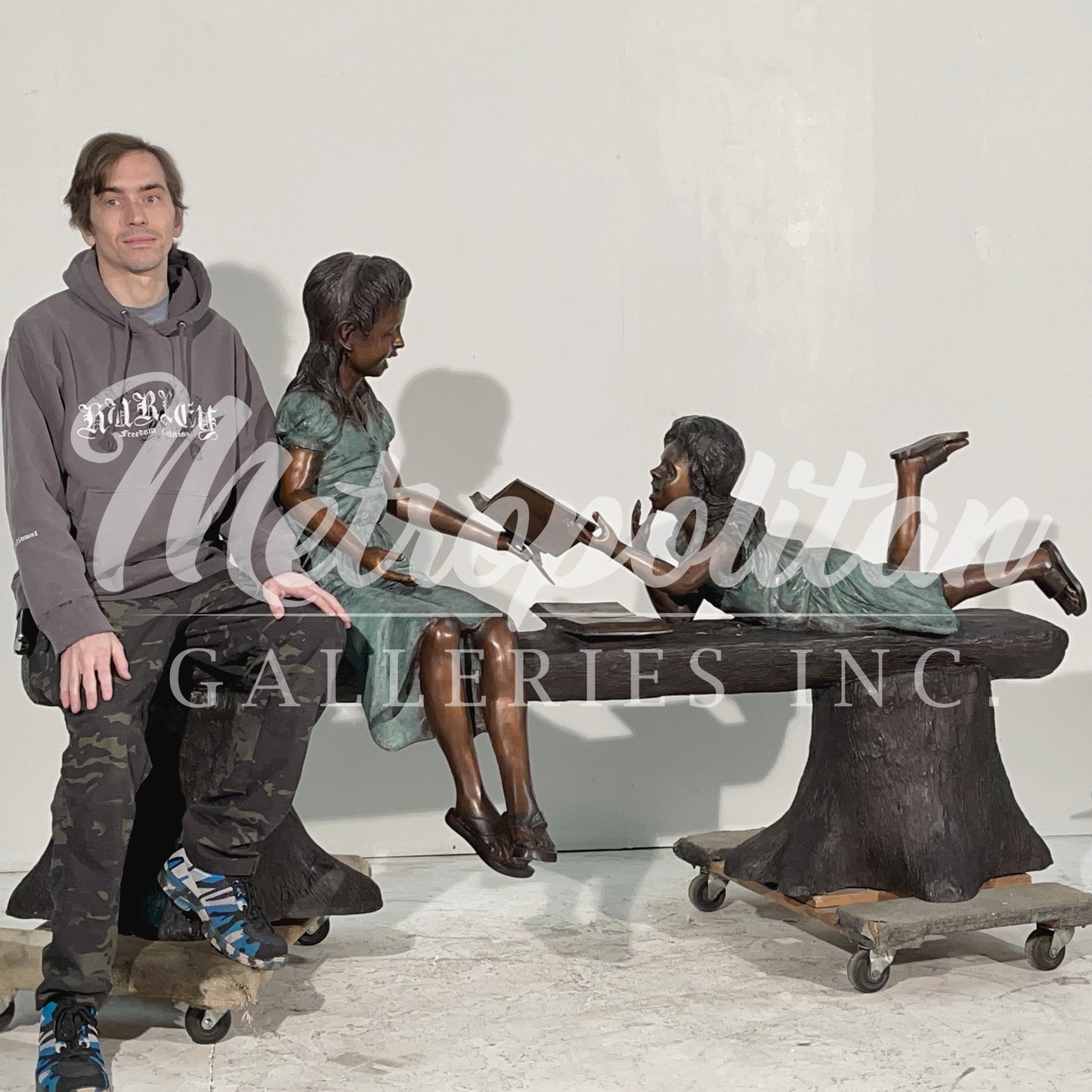 Two Girls Reading on Tree Trunk Bench Bronze Statue