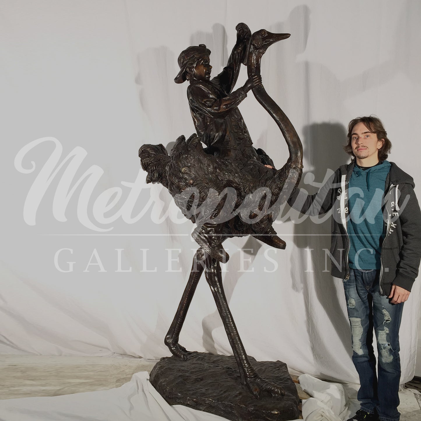 Boy riding Ostrich Bronze Statue
