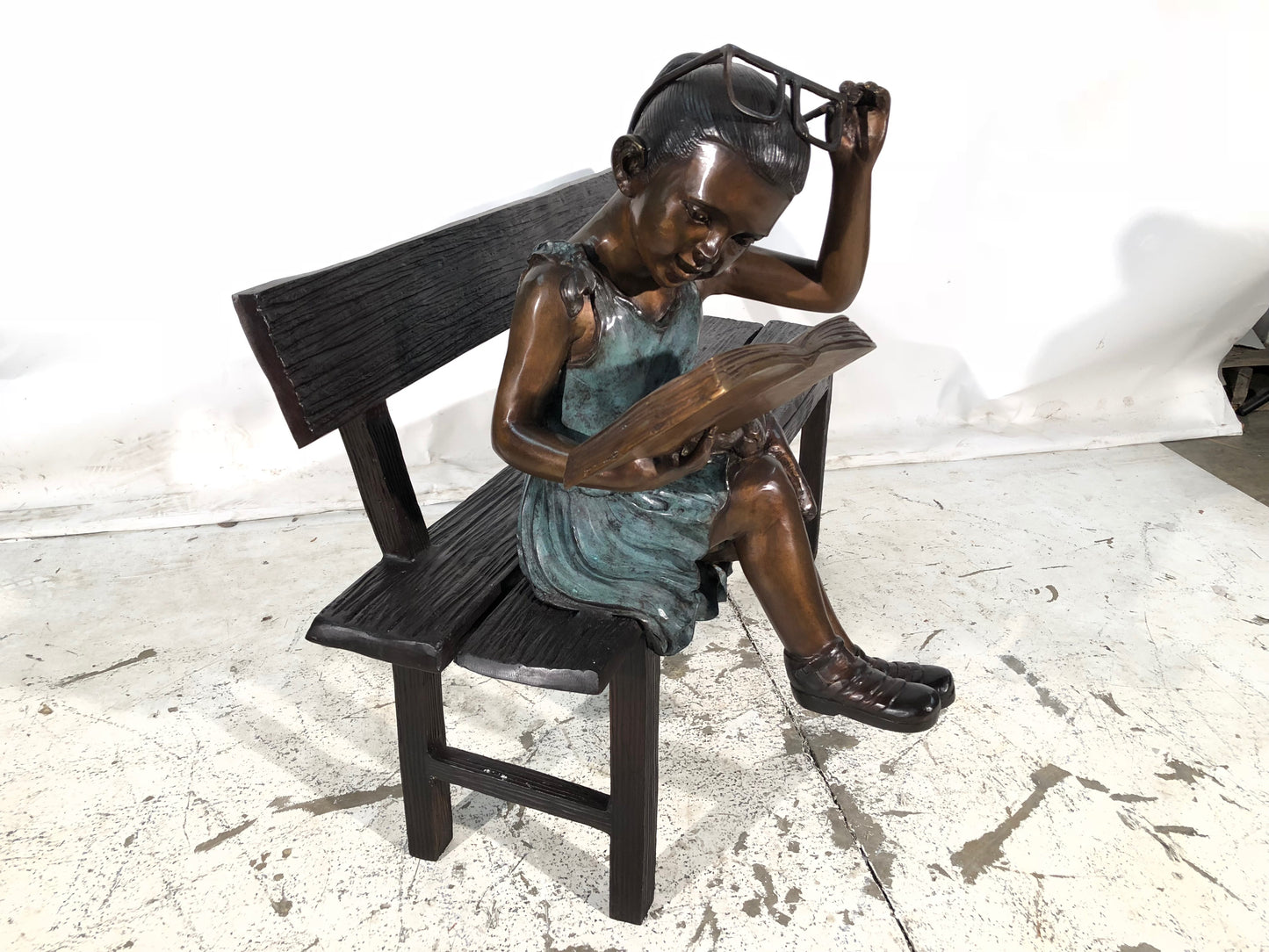 Girl Sitting on Bench Reading Book Bronze Statue