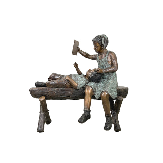 Boy & Girl Lounging on Bench Bronze Statue